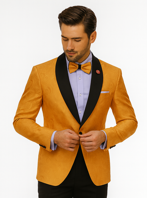 Gold-textured tuxedo jacket with black shawl lapel, paired with lavender shirt and bow tie. Single-button closure, tailored fit. Black trousers complete the formal, elegant ensemble.