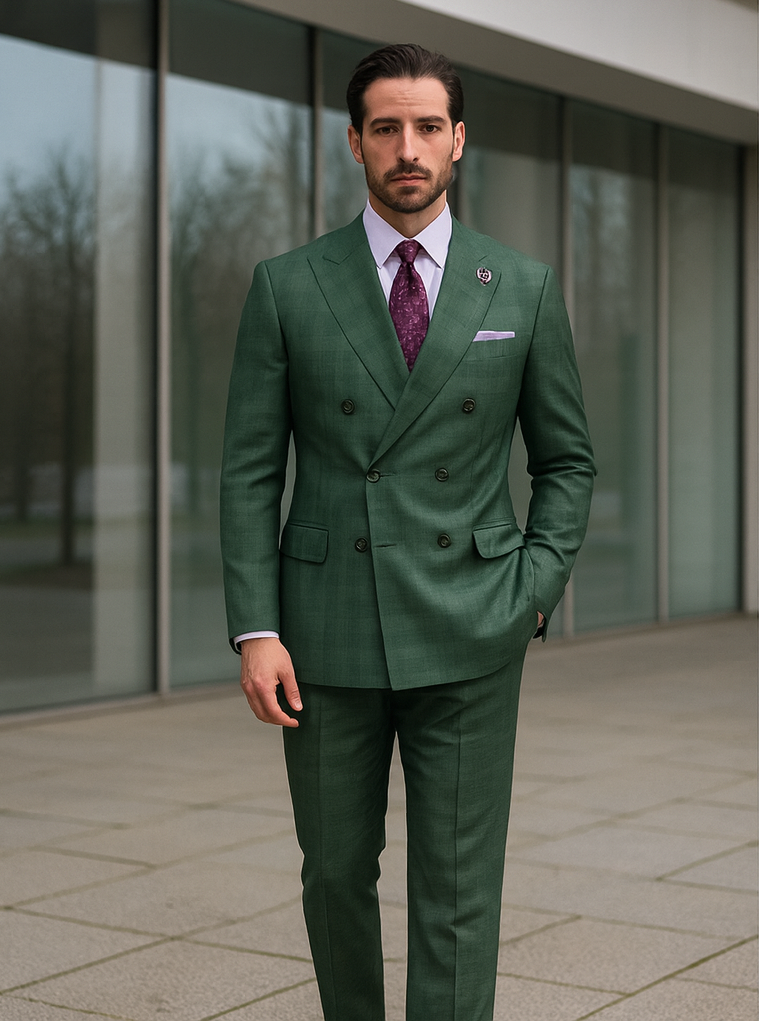 Men's deep green, double-breasted suit with a subtle check. Structured shoulders, tailored fit. Notch lapel, two rows of buttons, pocket square. Paired with a white shirt and textured purple tie. Slim-fit trousers.