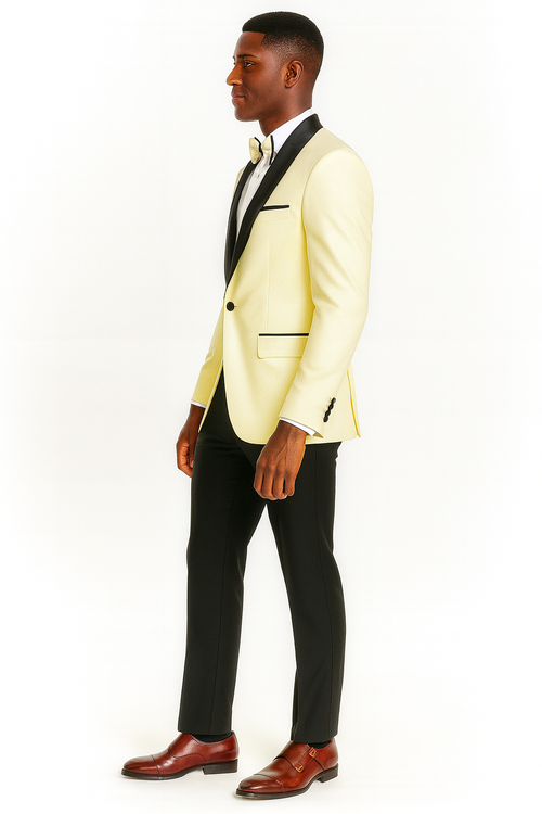 Big & tall ivory jacket suit with black shawl collar & pants. Single button closure. Includes black bow tie & tailored fit. Brown polished shoes complete the formal look.