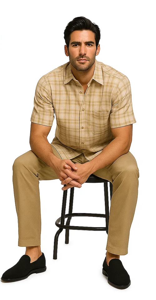 Men's tan cream textured plaid walking suit. Short-sleeve button-up shirt with plaid pattern and tailored light tan pants. Casual, unified color, woven texture. Shirt has buttons and a breast pocket.