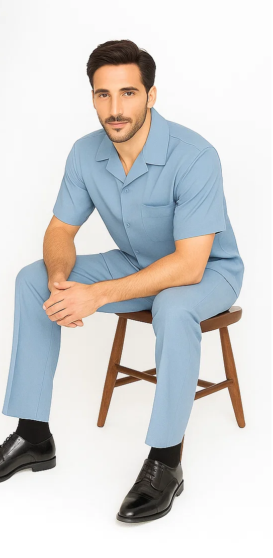 Powder blue men's leisure suit: short-sleeve shirt with straight collar, single pocket. Matching straight-leg pants. Lightweight, breathable fabric. Casual fit, worn with black shoes and socks.
