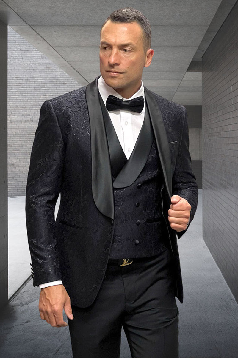 Black floral lace tuxedo. Satin lapel, fitted vest, and matching trousers. Elegant black ensemble for men.