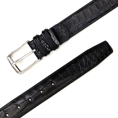 Mezlan AO7907 alligator belt in black. Narrow strap with textured alligator pattern, shiny finish. Silver metal buckle and adjustable holes.