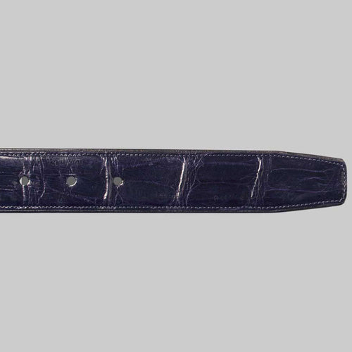 Mezlan AO7907 alligator belt. Long, slender, deep blue with a semi-gloss finish. Genuine alligator skin displays a textured pattern. Multiple adjustment holes and cleanly finished edges.
