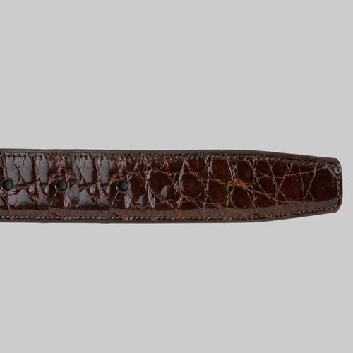 Glossy brown Mezlan alligator belt with a distinctive textured pattern. Features five black rivets, a tapered end, and stitched edges for enhanced durability.