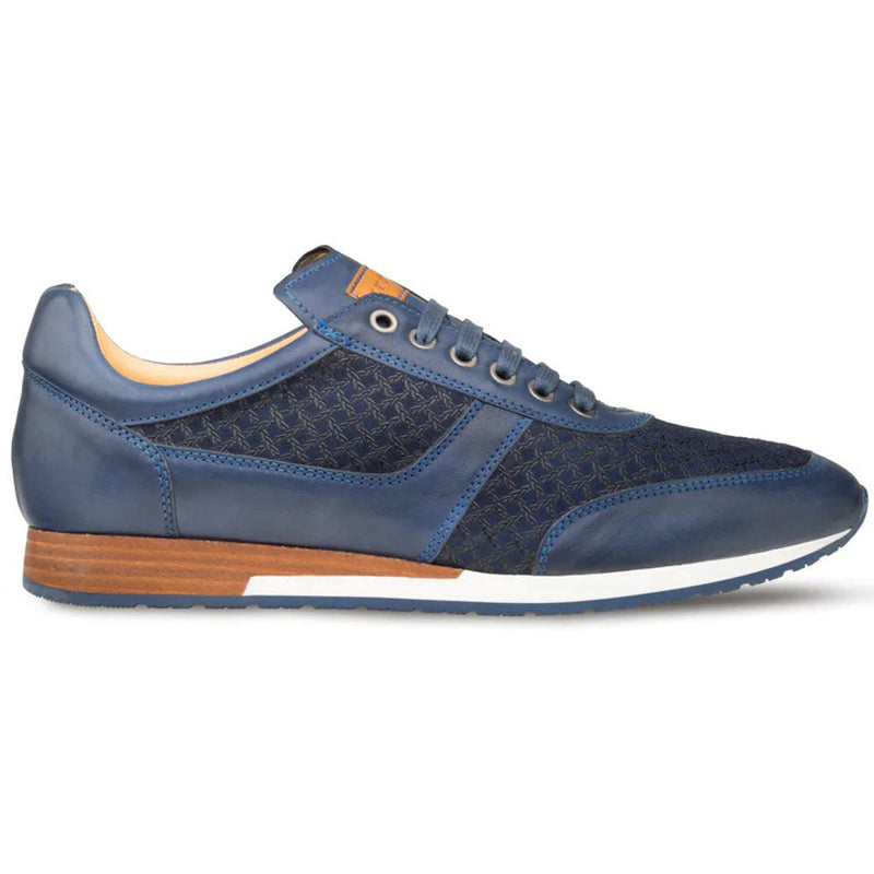 Blue Mezlan Maxim calfskin sneakers with textured sides. Smooth & textured calfskin upper, tan lining. Wooden heel, white sole with blue edge. Lace-up, rounded toe.
