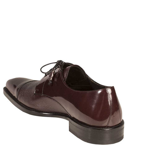 Mezlan Soka burgundy cap-toe oxford for men. Crafted from deerskin leather with a glossy finish, it features a classic lace-up design, low heel, and textured/smooth leather surfaces.