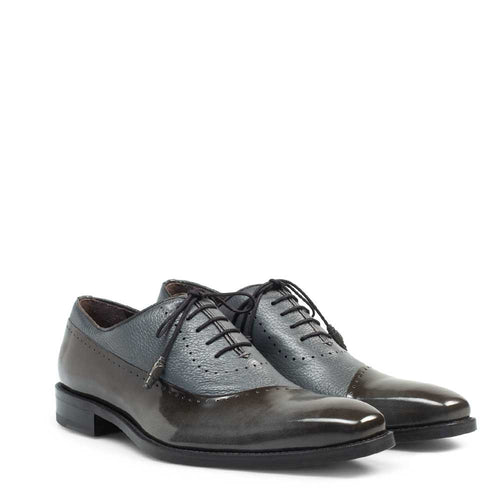 Mezlan Postdam oxford in grey calfskin. Cap toe design with perforated detailing. Features a polished dark grey toe, thin dark sole, and black laces.