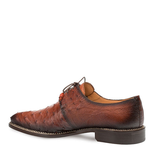 Mezlan Tillson blucher in brandy. Pointed toe, textured ostrich leather upper. Laced closure, warm brown color with darker toe accents. Dark sole with subtle stitching.