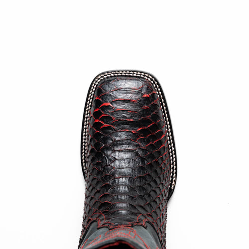 Marco Di Milano Missouri Cowboy Boots. Black python skin with red stitching and a square toe. Features contrasting smooth material on the upper edge. Primarily black with red accents.