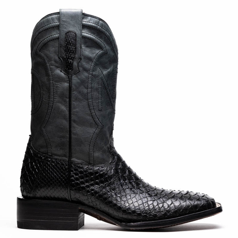 Marco Di Milano Missouri cowboy boots. Black python skin body with decorative stitching on a black leather shaft, square toe, and stacked wooden heel for a raised appearance.