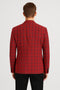 Modern red plaid blazer: Tailored fit, structured silhouette, notched lapels, and single vent. Bold red background with darker check pattern. Long sleeves with buttoned cuffs for a refined look.