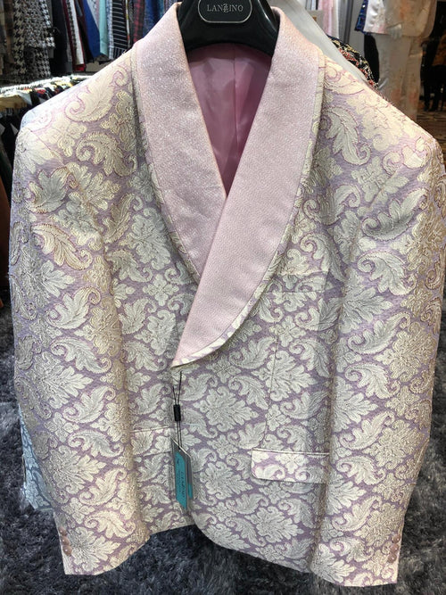 Lavender and gold men's tuxedo blazer with lilac background. Gold floral embroidery, pink shawl collar, and pocket detail. Stylish and sophisticated.