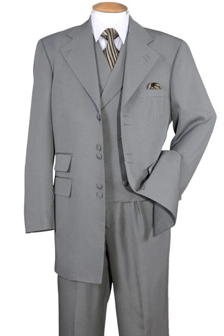 Light gray zoot suit: long, loose jacket with wide lapels, fitted vest, and tapered trousers. Smooth fabric, distinct buttons and pockets. A classic ensemble.
