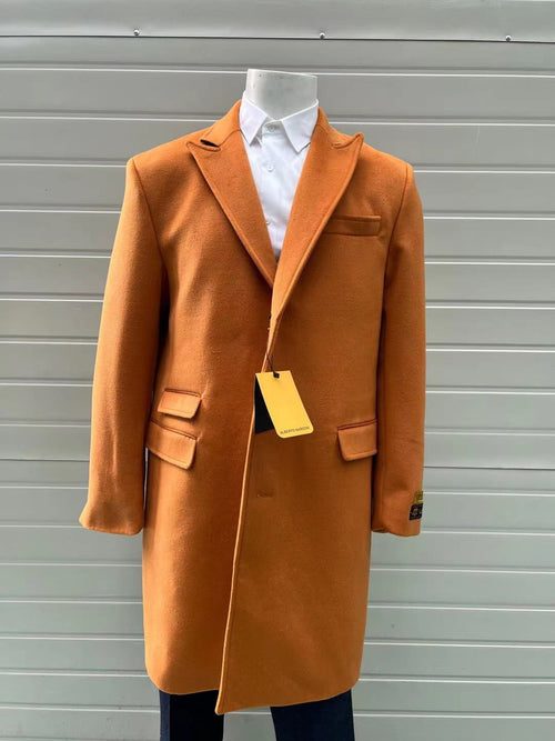 Men's rust orange wool blend overcoat with notched collar, two front pockets, and chest pocket. Smooth texture, even color.