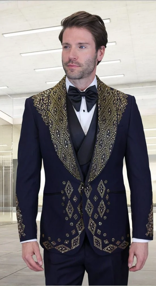 Navy men's tuxedo with gold embroidery, structured fit, and satin shawl collar. Features ornate diamond patterns and single-breasted design. Elegant formal wear.