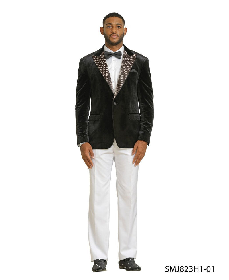 Black velvet tuxedo blazer with fitted shape and studded lapel. Deep black, soft velvet. Classic single-breasted design with notch lapel.