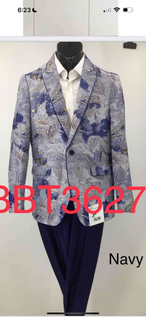 Navy and gray paisley men's blazer. Single-breasted, structured shape with notch lapels and front pocket. Detailed paisley pattern in navy and gray. Inner lining not visible.