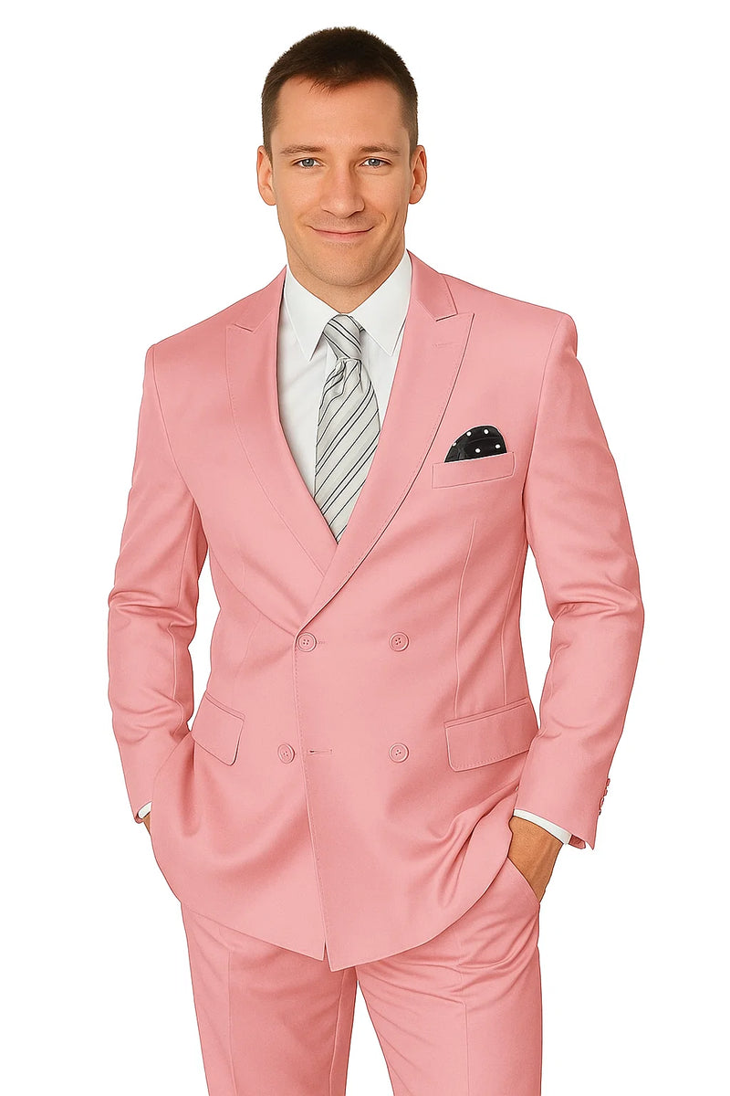 Elegant men's double-breasted wool suit in blush pink. Features a tailored fit, peak lapel, and matching trousers. Styled with a white shirt, striped tie, and polka dot pocket square.