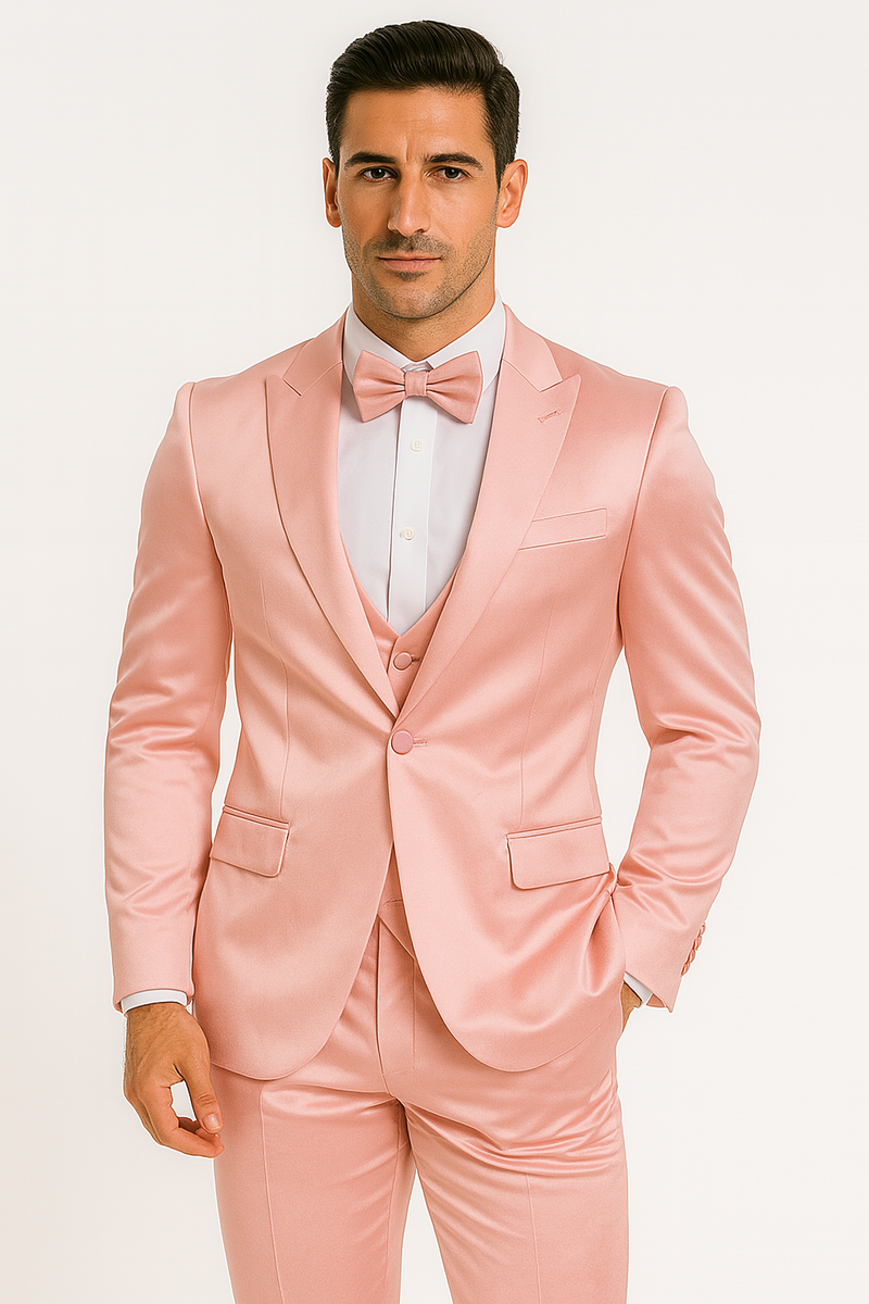 Alberto Nardoni's pink tuxedo set: fitted jacket, vest, trousers & bow tie. Satin finish, soft pink. Jacket: single button, notch lapels. Vest: matching, buttoned. Trousers: straight leg. White shirt contrast.