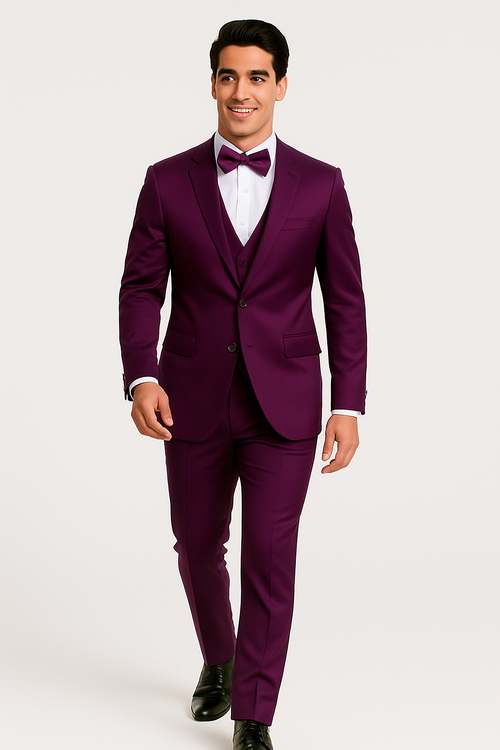 Purple Majesty tuxedo set: 4-piece formal ensemble. Fitted jacket with classic lapel and single button. Tailored trousers, matching bow tie, and white dress shirt. Deep purple, smooth, structured fabric.