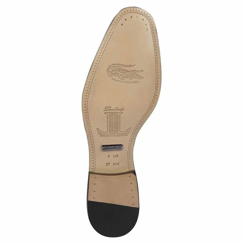 Navy crocodile and calfskin slip-on dress shoes. Smooth, high-gloss finish. Black leather sole with rounded toe and decorative stitching. Genuine leather.