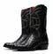 Black ostrich quill cowboy boots by Marco Di Milano. Tall shaft with curved top, textured leather, round toe. Moderate stacked heel. White stitching design, red lining, pull tabs. Ostrich skin texture.
