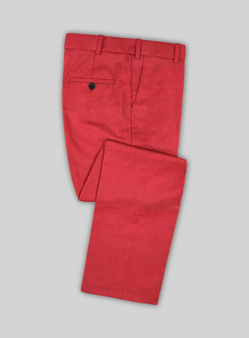 Red suit pants with smooth texture and straight leg. Single back pocket with button closure. Belt loops at the waist. Classic and versatile.