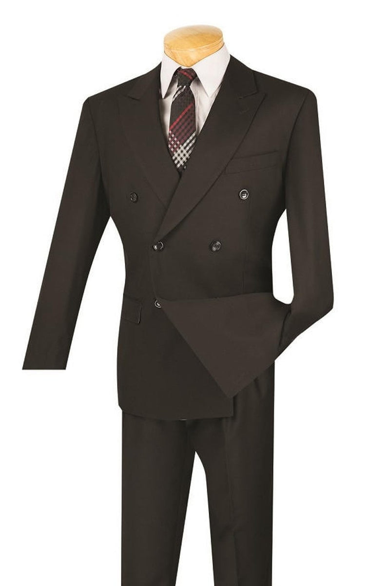 Black double-breasted suit with a modern fit. Tailored jacket, peaked lapels, dual pockets. Straight-leg trousers. Includes white shirt and patterned tie.