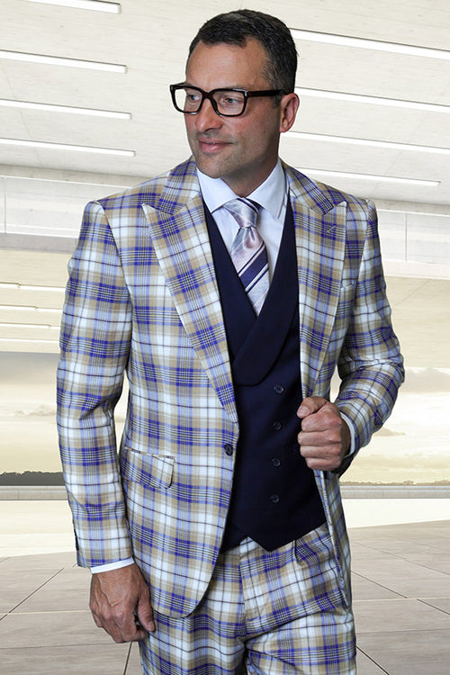 Sapphire blue plaid suit with peak lapels, Italian wool. Features a double-breasted vest. Colors: blue, beige, cream. Slim silhouette, structured shoulders. Jacket: one-button. Vest: six-button.
