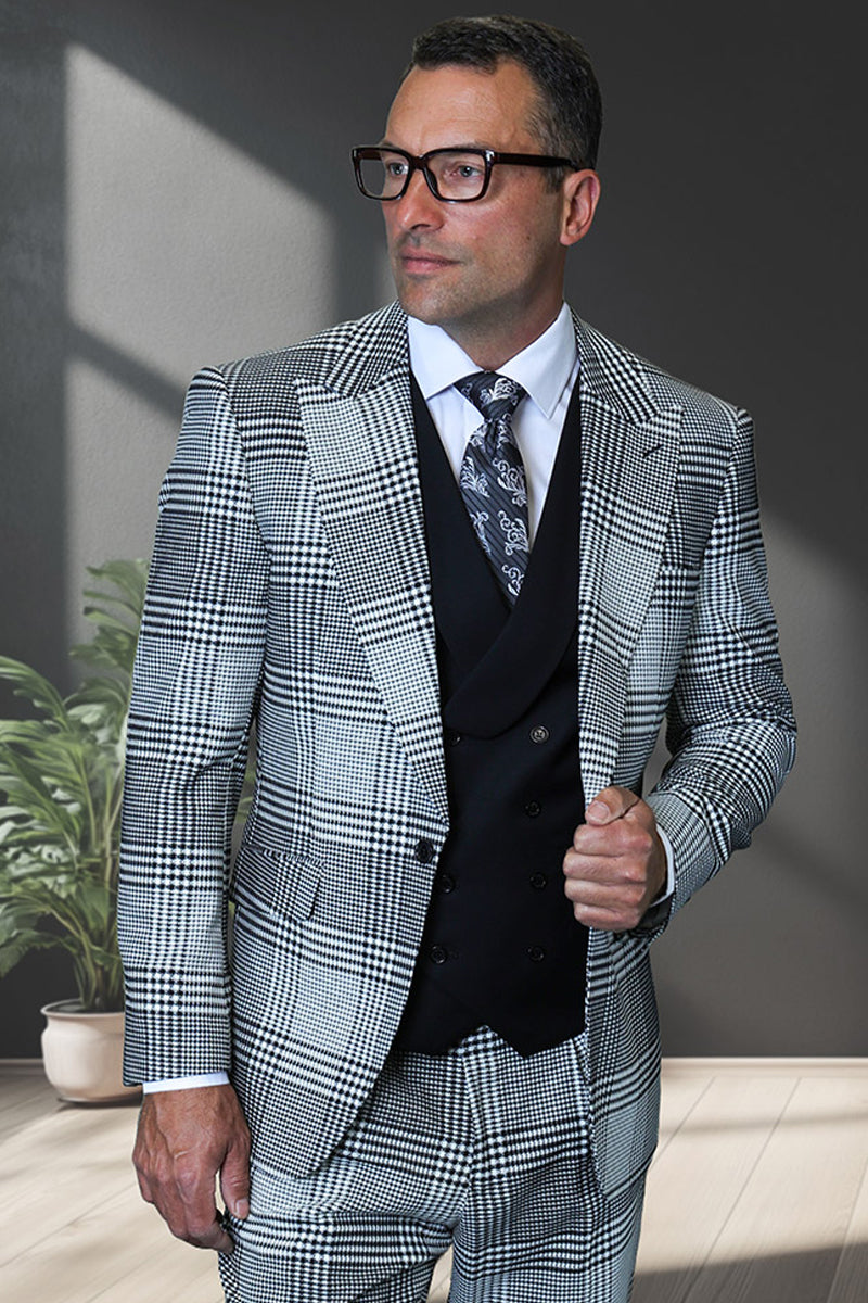 Men's Italian wool suit with houndstooth plaid. Features a peak lapel, one-button jacket and double-breasted vest. Available in black and white.

