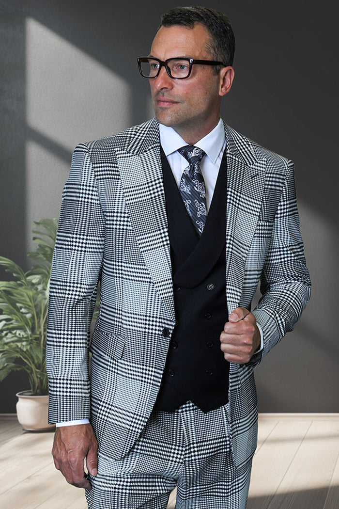 Men's Italian wool suit with houndstooth plaid. Features a peak lapel, one-button jacket and double-breasted vest. Available in black and white.
