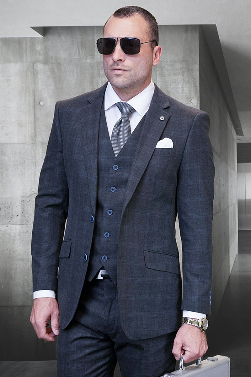 Men's charcoal grey plaid suit. Modern fit, three-piece wool blend with a two-button jacket, matching vest, and pants. Features textured fabric and blue buttons.
