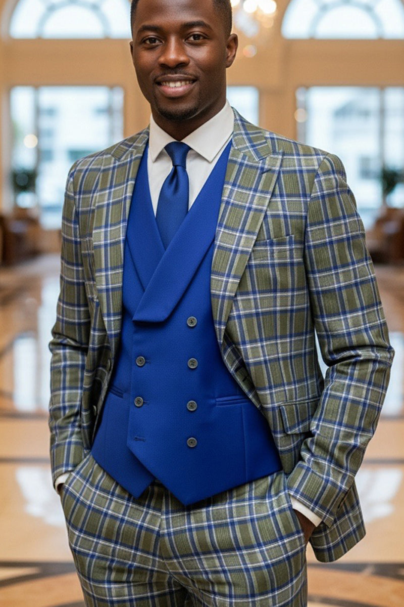 Men's designer suit: royal blue plaid Italian wool with peak lapels & single button jacket. Includes a solid royal blue double-breasted vest & tailored pants, creating a cohesive, fitted look.

