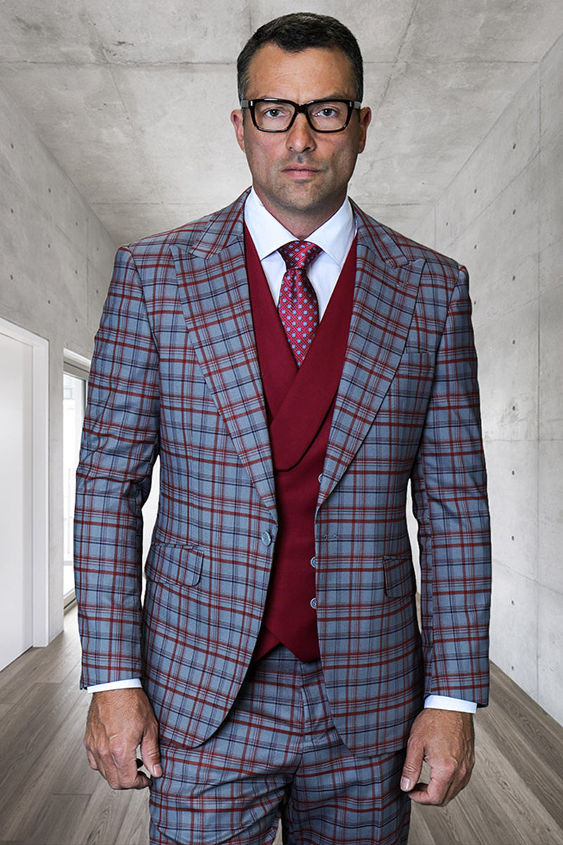 Men's designer suit: grey plaid jacket (peak lapel, Italian wool) & matching double-breasted vest. Plaid: blue/burgundy. Tailored fit, structured shoulders.
