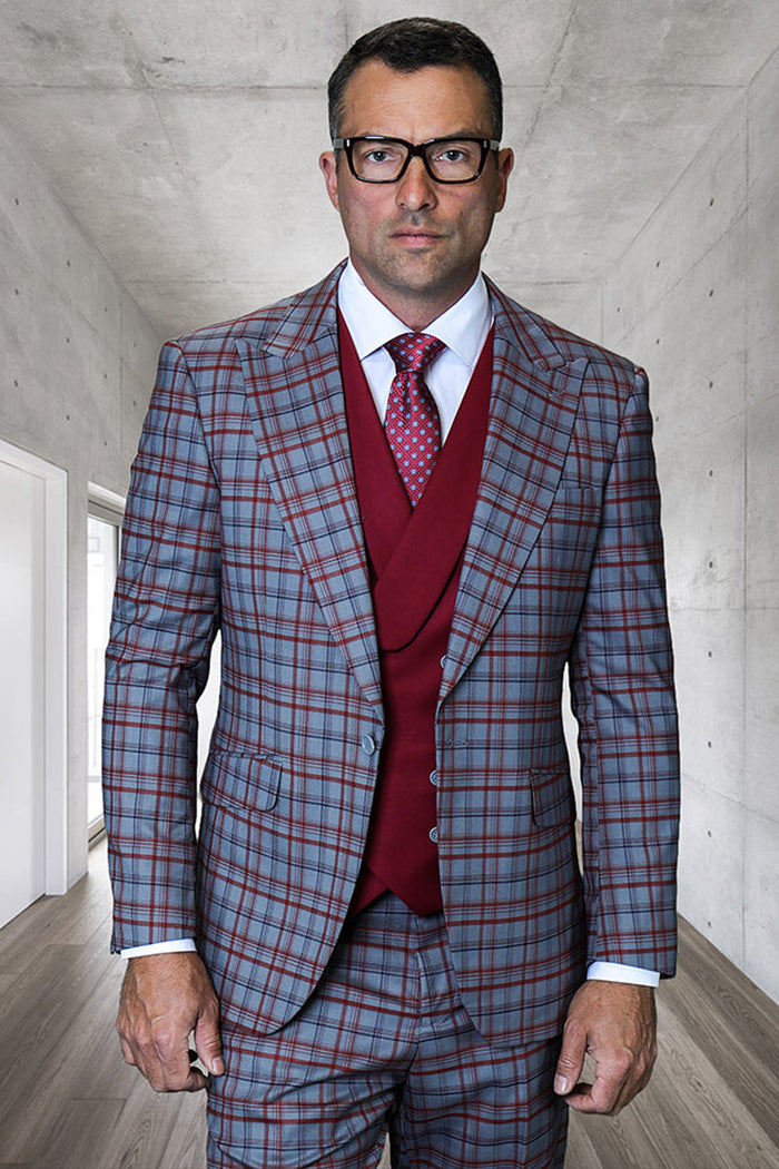 Men's designer suit: grey plaid jacket (peak lapel, Italian wool) & matching double-breasted vest. Plaid: blue/burgundy. Tailored fit, structured shoulders.
