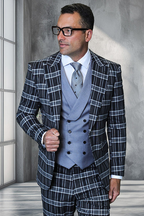 Men's designer suit: Italian wool, black windowpane plaid, peak lapel. Includes light gray double-breasted vest with black buttons. Structured fit, dark tones with contrasting vest.
