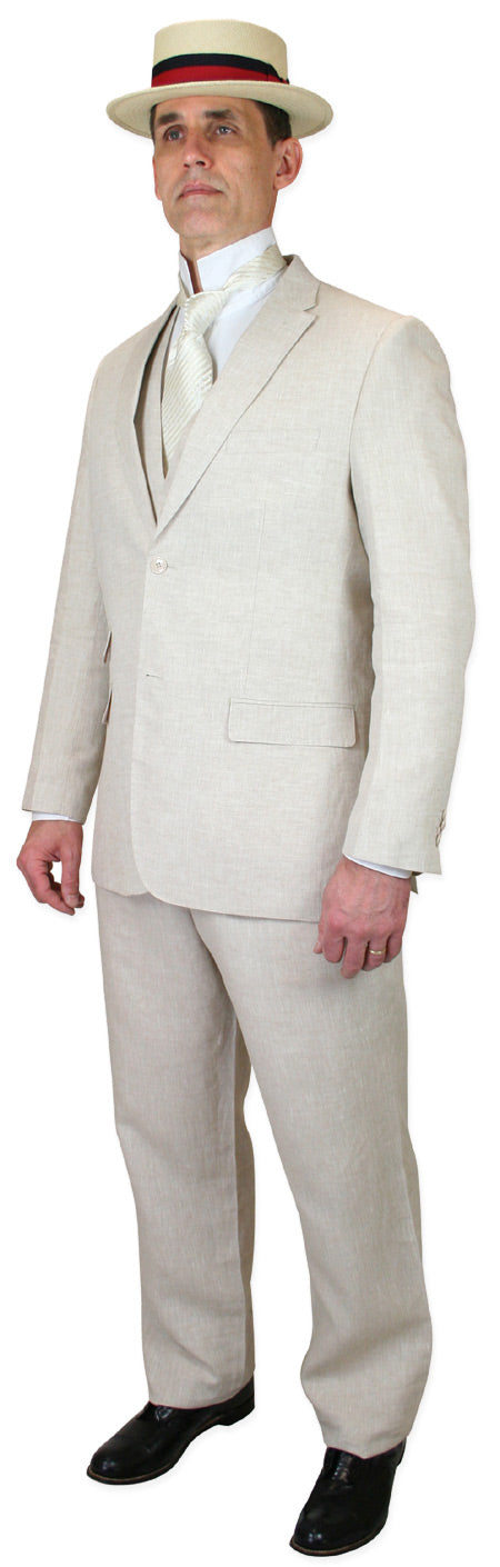 Riverdale linen suit: Natural-colored, three-piece ensemble. Includes a single-breasted jacket with notched lapels & pockets, matching straight-leg trousers, and a waistcoat. Tailored fit, lightweight linen, perfect for summer.
