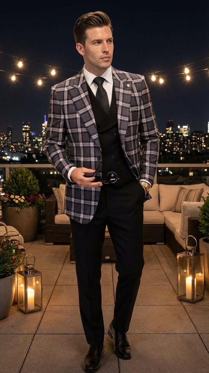 Men's charcoal gray and black plaid big & tall blazer. Structured, single-breasted design with notch lapels and button closure. Bold plaid pattern. Long sleeves, button cuffs, relaxed fit.
