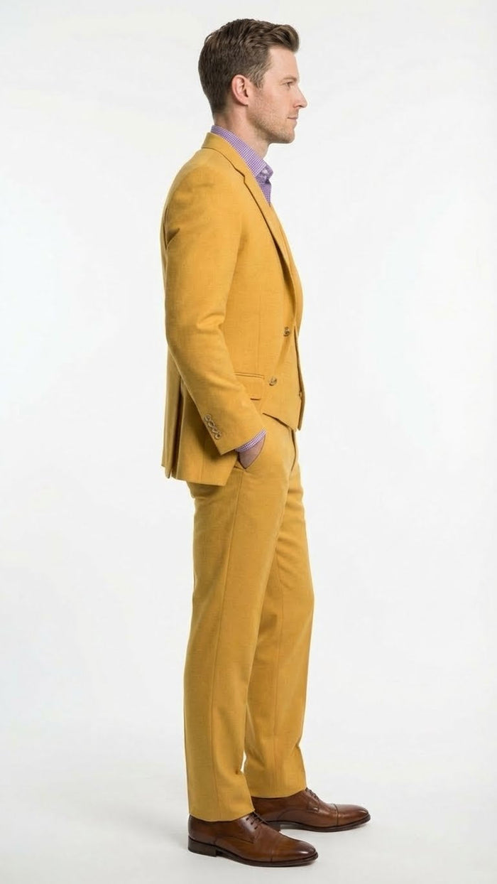 Mustard yellow men's three-piece suit with a two-button notch lapel and modern fit. Solid fabric. Includes tailored jacket and matching trousers for a streamlined silhouette.
