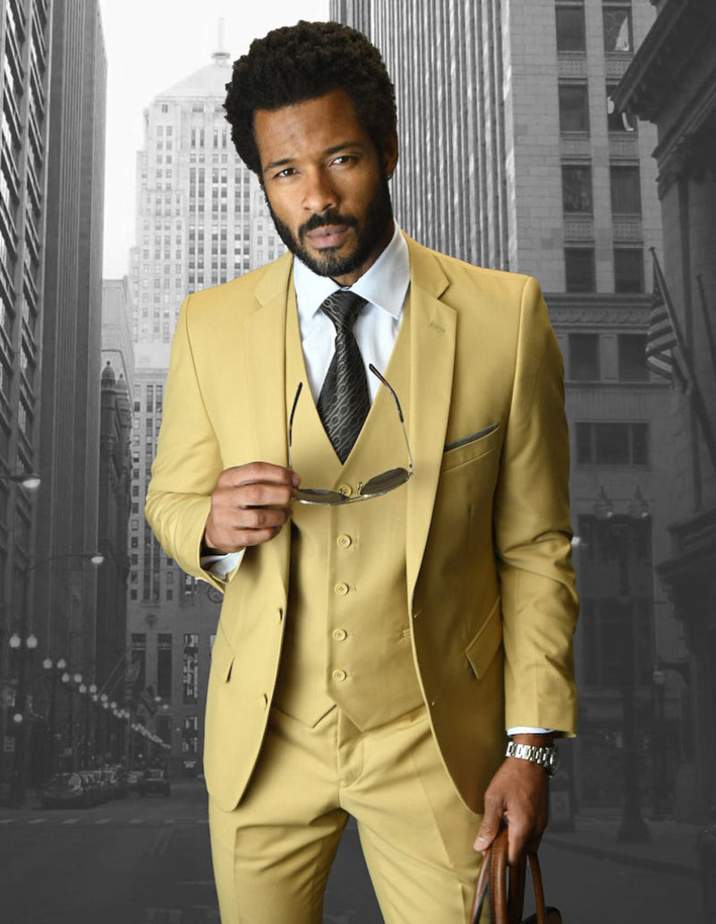 Men's chestnut two-button skinny vested wool suit. Slim-fit jacket and vest, tapered trousers. Smooth wool with a slight sheen, structured design.
