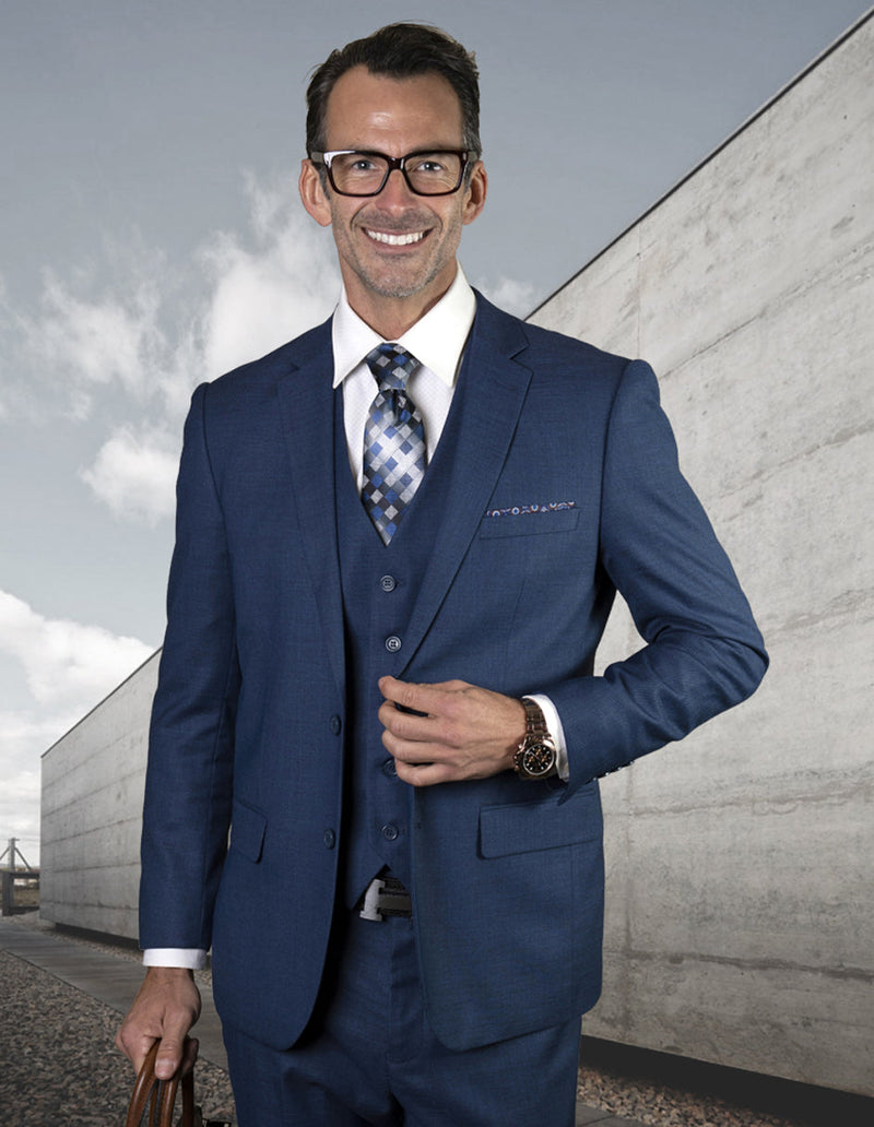 Men's slim fit sapphire blue wool suit. Features a 2-button closure, 3-piece vest, notched lapel, two front pockets, and a single back vent. Tailored for a sleek look.