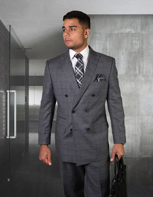 Charcoal grey double-breasted wool suit with windowpane pattern. Structured fabric, lapels, and button rows. Includes matching tailored pants and a coordinated pocket square.
