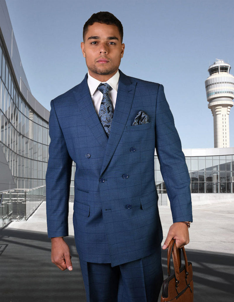 Men's indigo windowpane wool double-breasted suit. Tailored fit, notch lapels, side pockets. Jacket with matching trousers. Structured shape.
