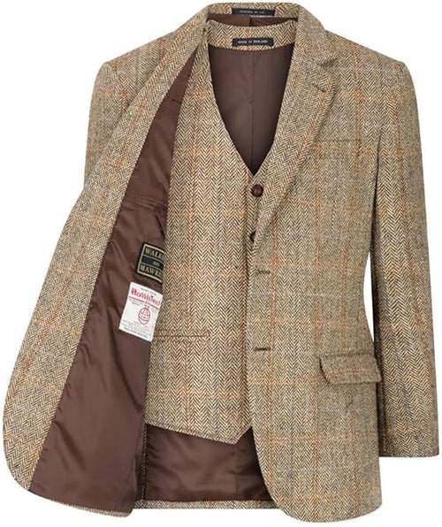 Blakemore herringbone blazer in beige and brown. Structured with peaked lapels, single button, and contrasting lining. Tailored fit with inner vest pocket.
