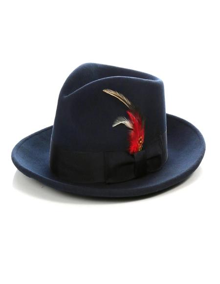 1920s gangster hat: Dark navy, soft structure, tapered crown, wide brim. Features a red feather and black ribbon band. Classic men's style.