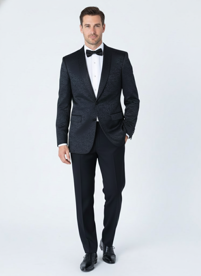 Alberto Nardoni men's black tuxedo suit. Fitted jacket with subtle paisley texture, black satin lapels. Matching tailored trousers. Elegant floral design.
