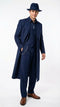 Navy blue men's zoot suit with a long coat, vest, and wide-leg trousers. Textured fabric, matching hat, and silver chain detail complete the look.
