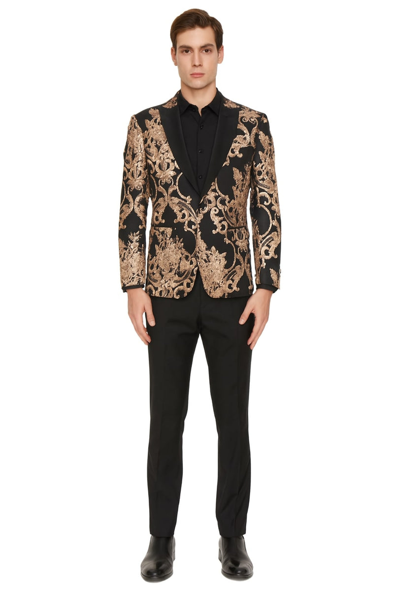 Black blazer with rose gold floral embroidery, peak lapels, and structured silhouette. Paired with tailored straight-leg black pants. Smooth fabric for a cohesive, bold look.
