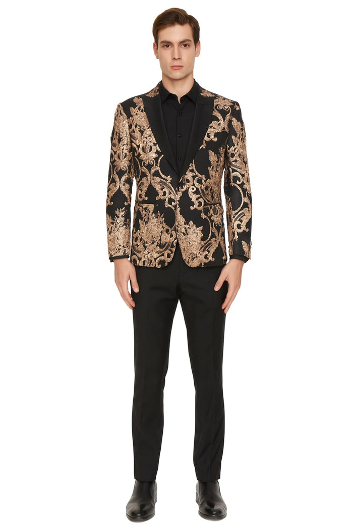 Black blazer with rose gold floral embroidery, peak lapels, and structured silhouette. Paired with tailored straight-leg black pants. Smooth fabric for a cohesive, bold look.
